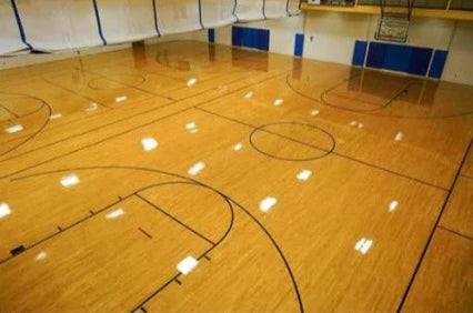 Bona SuperCourt OPTUM, the premium 1-component waterborne athletic wood floor finish. Engineered for superior performance, this finish offers unmatched scuff, scratch, and chemical resistance at full cure. Its exceptional build ensures excellent flow and leveling, making it the top choice for sports facilities.